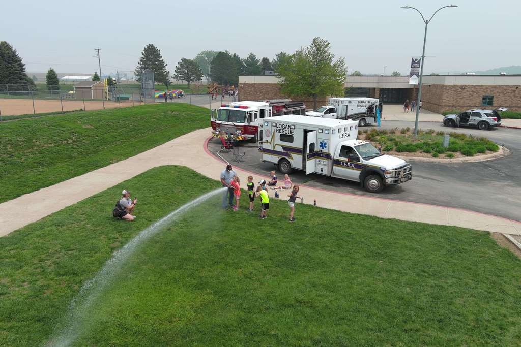 Students using a fire hose